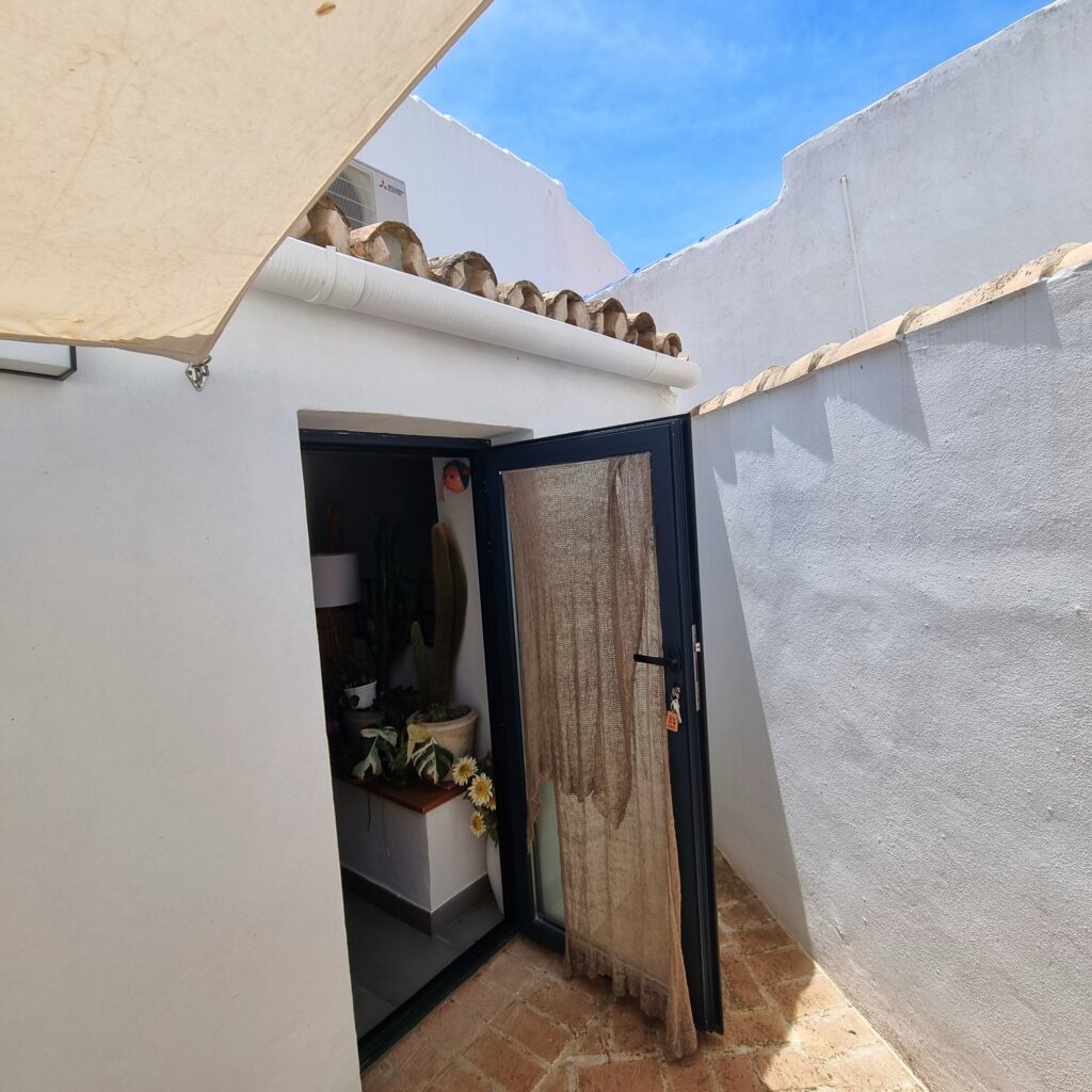 Renovated property Andalusia village house garden sale Zuheros, Cordoba, Spain. Nature mountains hiking cycling and cuisine. Buy Sell.